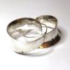 Fine Silver Anticlastic hammered hoop earrings